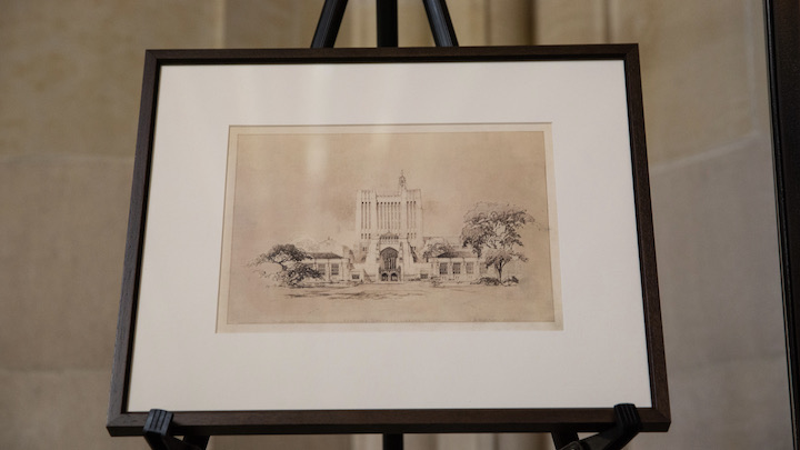 framed picture on an easel showing archival image of Sterling Memorial Library