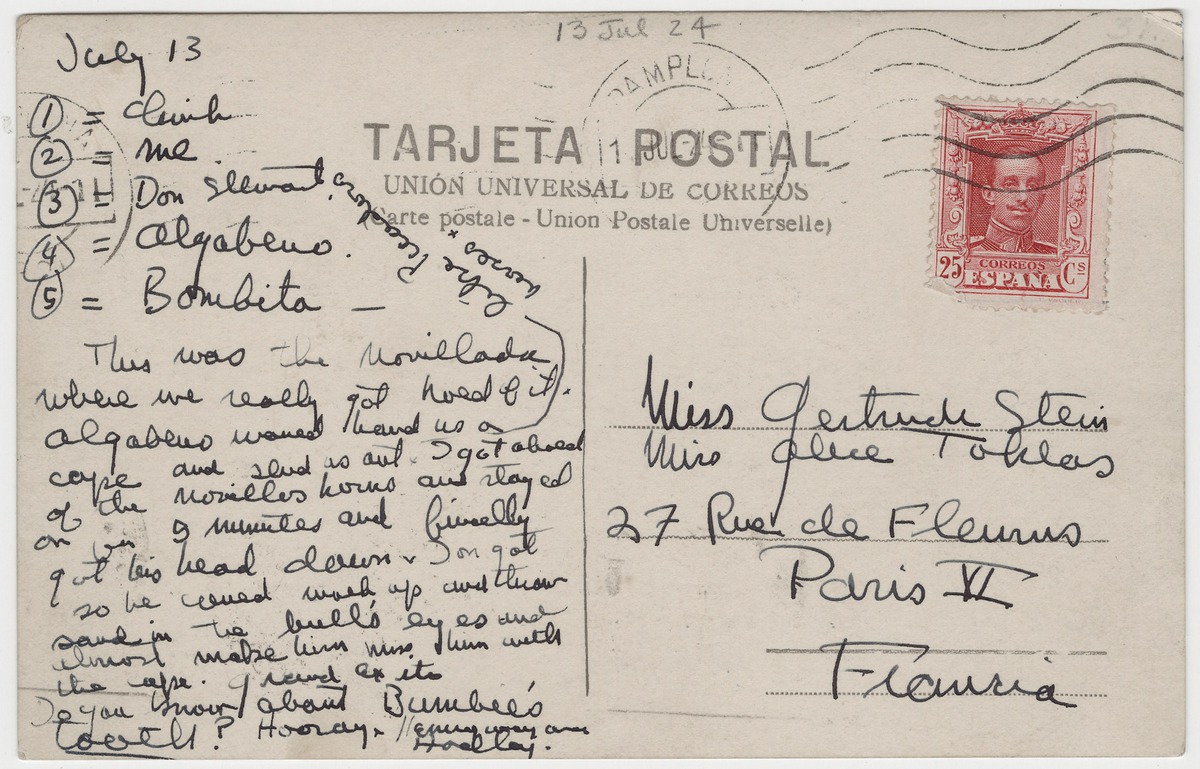 an envelop with handwritten texts with red postage stamp on the top right corner