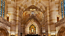 Interior of Sterling Memorial, showing Alma Mater at far end