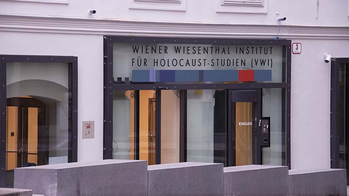 An entrance with a sign reading WIENER WIESENTHAL INSTITUT FUR HOLOCAUST-STUDIEN (VWI)
